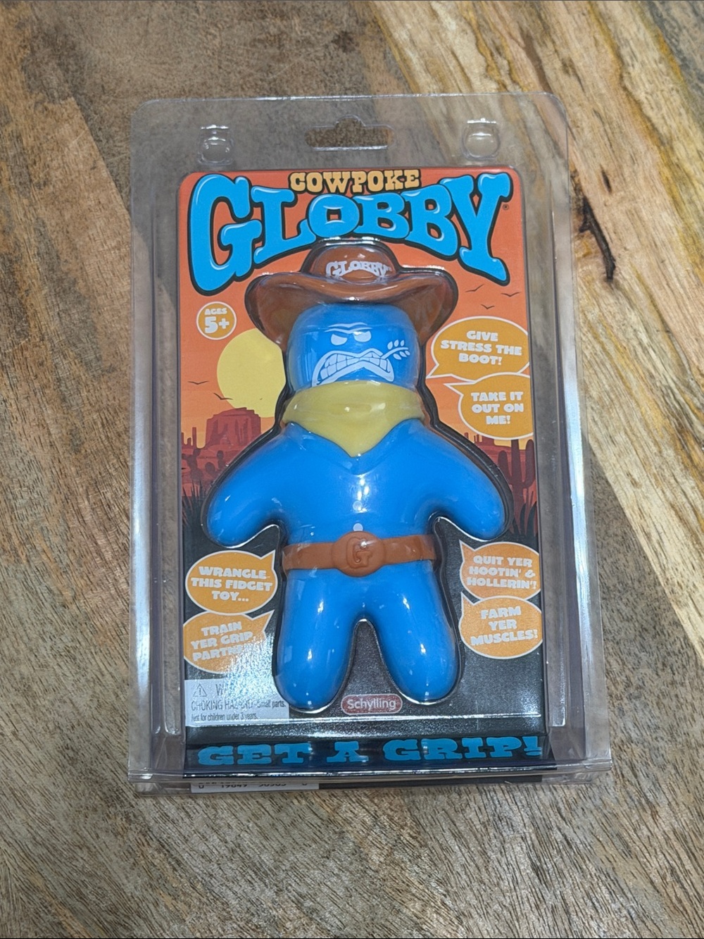 Cowpoke Globby Blue Cowboy Squeeze Toy by Schylling